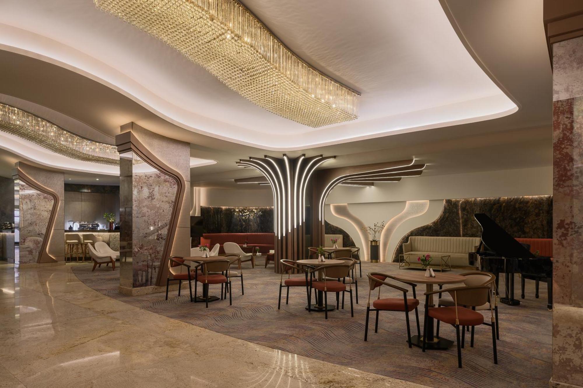 Mirage Hotel & Conference Center Alexandria Exterior photo The interior of the lounge